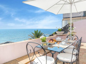 Ancient residence overlooking the sea with garden